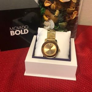 Movado bold gold watch w/ crystal
